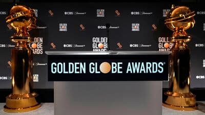Replicas of Golden Globe statues appear behind the podium at the nominations for the 81st Golden Globe Awards at the Beverly Hilton Hotel on Monday, Dec. 11, 2023, in Beverly Hills, Calif. The 81st Golden Globe Awards will be held on Sunday, Jan. 7, 2024. (AP Photo/Chris Pizzello)